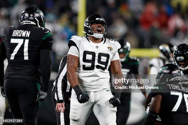 Jeremiah Ledbetter of the Jacksonville Jaguars reacts after making a tackle during an NFL football game between the New York Jets and the...
