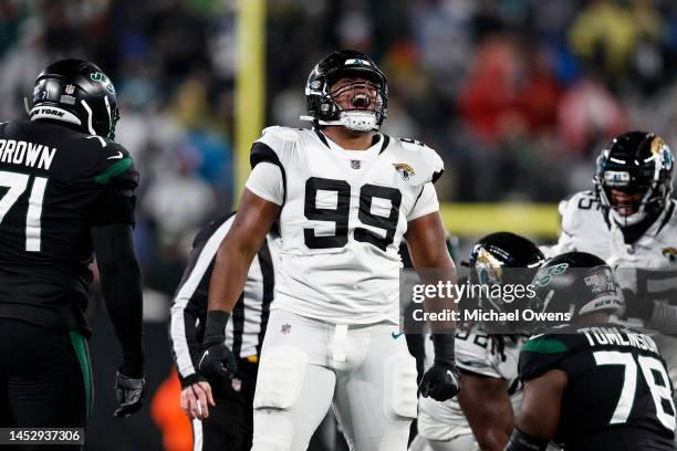 Jeremiah Ledbetter of the Jacksonville Jaguars reacts after making a tackle during an NFL football game between the New York Jets and the...