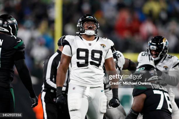 Jeremiah Ledbetter of the Jacksonville Jaguars reacts after making a tackle during an NFL football game between the New York Jets and the...