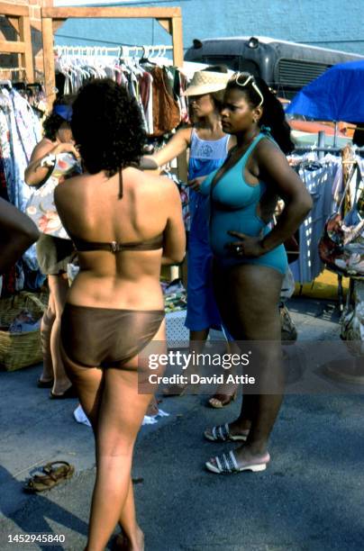 Bikini-clad women shop in Muscle Beach, the birthplace of the fitness and bodybuilding craze, in September, 1979 in Venice, California.