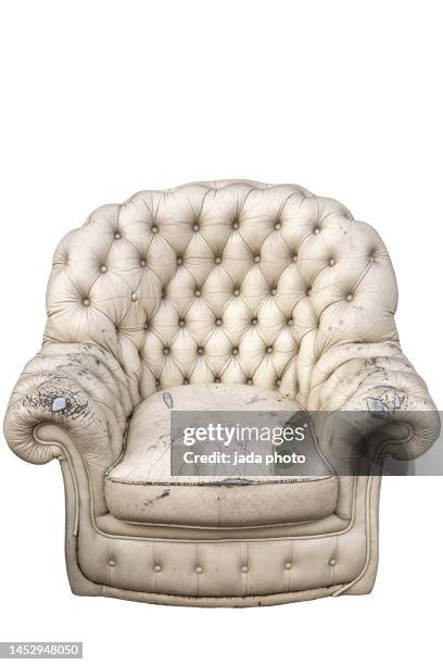 detached image of a worn cream-colored leather armchair - comfortable chair stock pictures, royalty-free photos & images