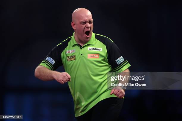 Michael van Gerwen of Netherlands celebrates during his Third Round match against Mensur Suljovic of Serbia during Day Nine of The Cazoo World Darts...