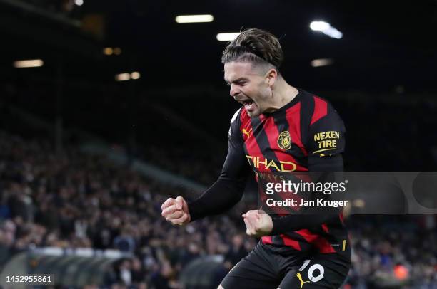 Jack Grealish of Manchester City celebrates after assisting his sides second goal scored by Erling Haaland during the Premier League match between...