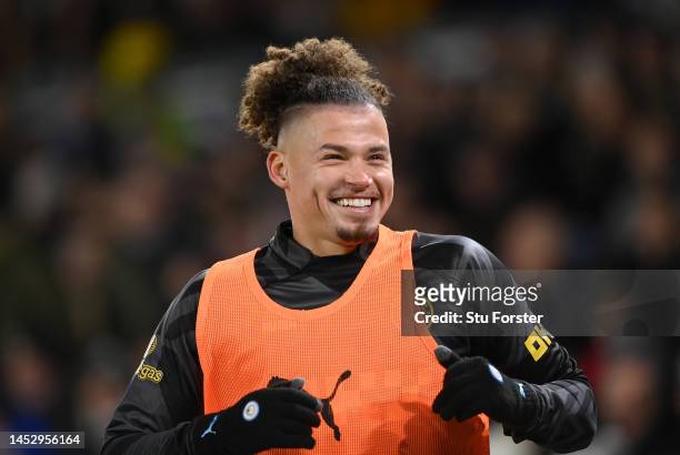Kalvin Phillips of Manchester City warms up on the bench during the Premier League match between Leeds United and Manchester City at Elland Road on...