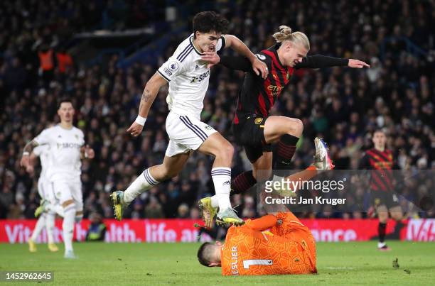 Erling Haaland of Manchester City has a shot saved by Illan Meslier of Leeds United under whilst under pressure from Pascal Struijk during the...