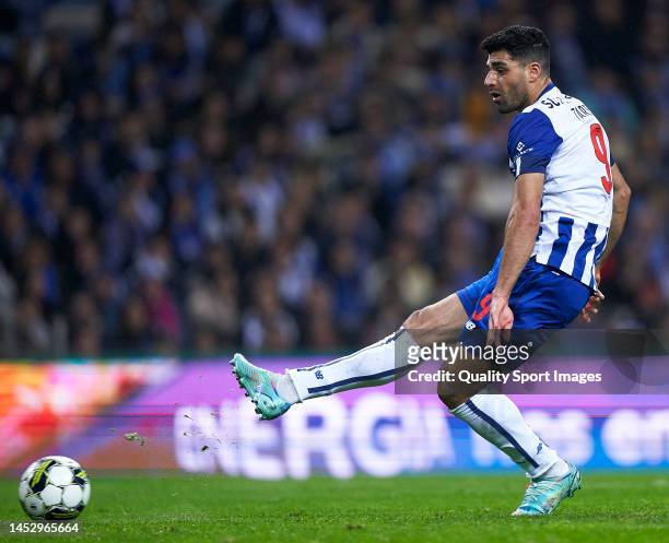 Mehdi Taremi of FC Porto shoots on goal and scores his team's third goal during the Liga Portugal Bwin match between FC Porto and FC Arouca at...