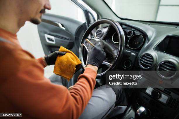 professional car detailer at work - car detailing stock pictures, royalty-free photos & images