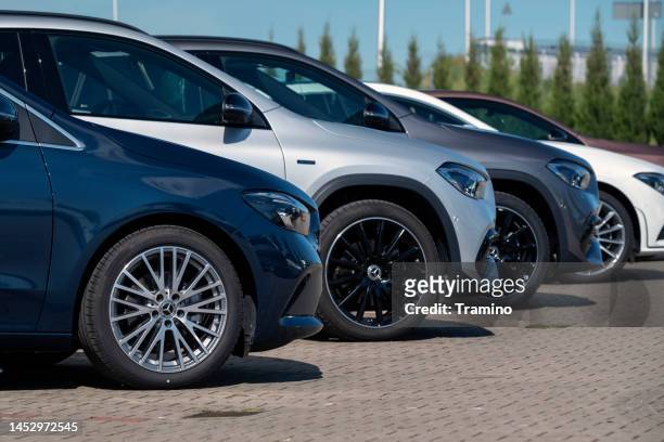 mercedes-benz vehicles on a parking - mercedes benz stockfoto's en -beelden