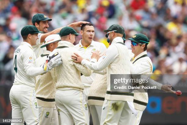 Scott Boland of Australia celebrates the dismissal of Theunis de Bruyn of South Africa during day four of the Second Test match in the series between...