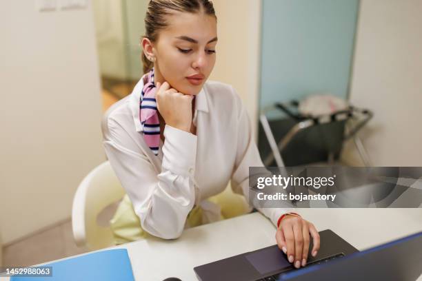 young businesswoman at work place - malta business stock pictures, royalty-free photos & images