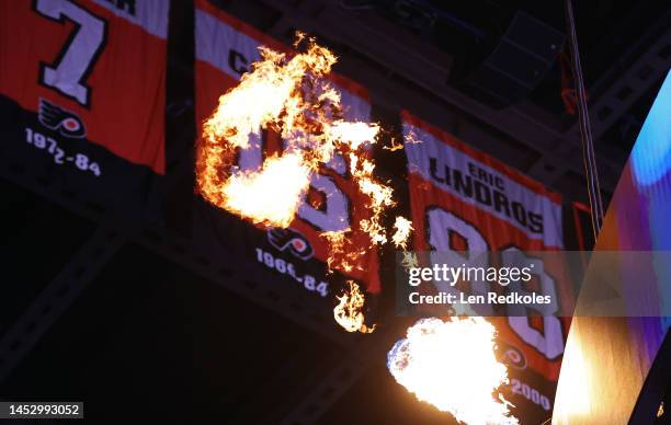 View of the retired player numbers of Bill Barber, Bobby Clarke and Eric Lindros of the Philadelphia Flyers prior to an NHL game against the Columbus...