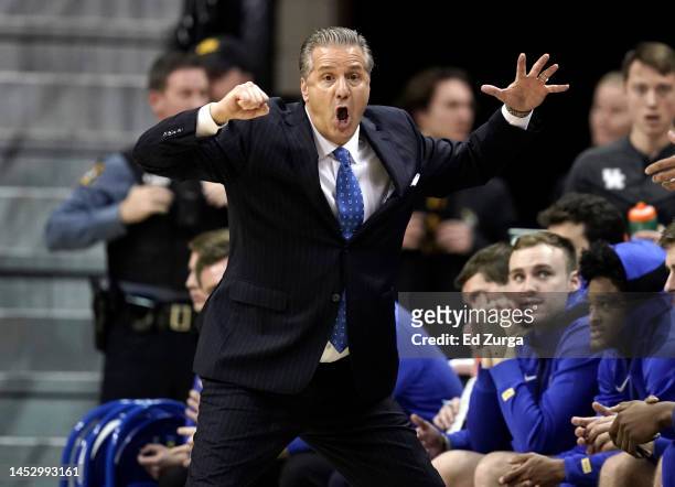 Head coach John Calipari of the Kentucky Wildcats reacts to a foul call against the Missouri Tigers in the first half at Mizzou Arena on December 28,...