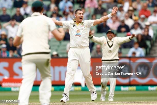 Scott Boland of Australia celebrates the wicket of Kyle Verreynne of South Africa during day four of the Second Test match in the series between...