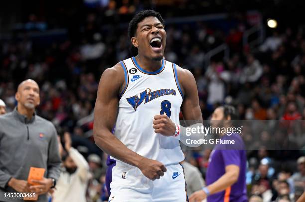 Rui Hachimura of the Washington Wizards celebrates in the fourth quarter against the Phoenix Suns at Capital One Arena on December 28, 2022 in...