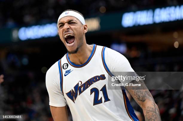 Daniel Gafford of the Washington Wizards celebrates in the fourth quarter against the Phoenix Suns at Capital One Arena on December 28, 2022 in...