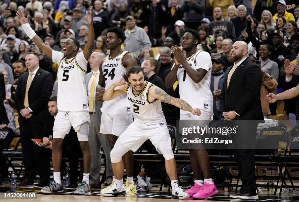 Members of the Missouri Tigers start to celebrate towards the end of their game against the Kentucky Wildcats in the second half at Mizzou Arena on...