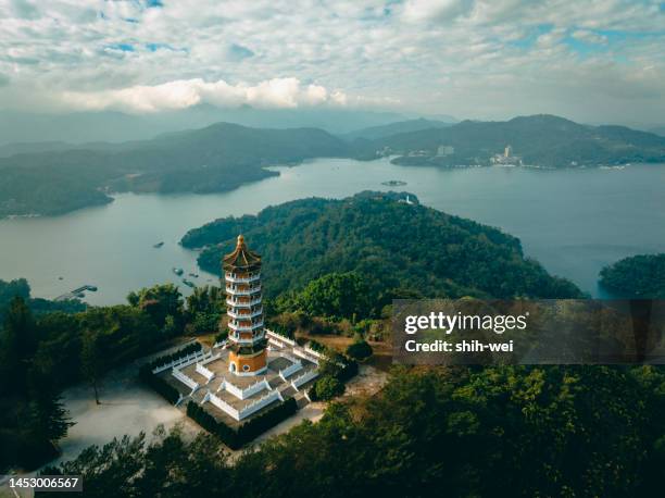 aerial view landscape of sun moon lake and ci'en pagoda in nantou, taiwan. - pagoda stock pictures, royalty-free photos & images