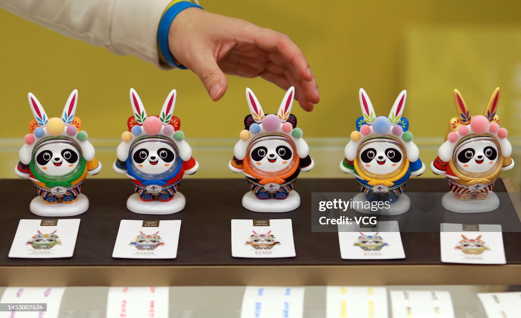 A customer touches a doll of Bing Dwen Dwen the mascot of the 2022 News Photo Getty Images A customer touches a doll of Bing Dwen Dwen the mascot of the 2022 News Photo Getty Images