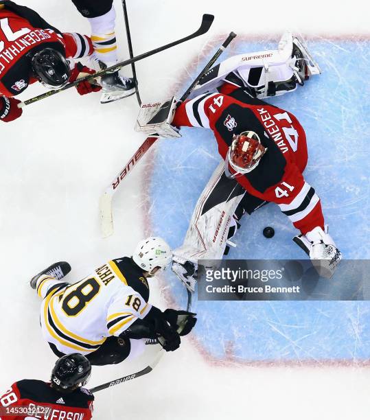 Vitek Vanecek of the New Jersey Devils makes the second period save on Pavel Zacha of the Boston Bruins at the Prudential Center on December 28, 2022...
