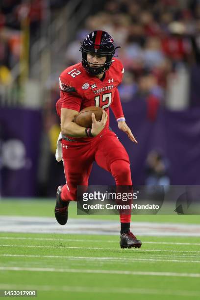 Tyler Shough of the Texas Tech Red Raiders rushes with the ball against the Mississippi Rebels during the first half at NRG Stadium on December 28,...