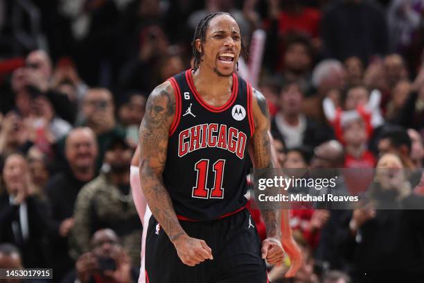 DeMar DeRozan of the Chicago Bulls celebrates a basket against the Milwaukee Bucks in overtime at United Center on December 28, 2022 in Chicago,...