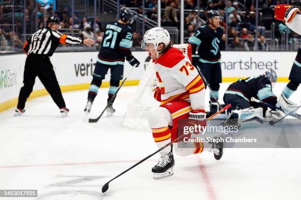 Tyler Toffoli of the Calgary Flames celebrates his goal against the Seattle Kraken during the first period at Climate Pledge Arena on December 28,...