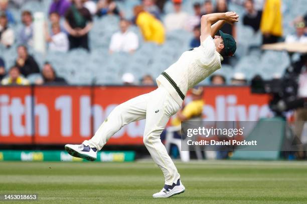 Pat Cummins of Australia takes a catch to dismiss Kagiso Rabada of South Africa during day four of the Second Test match in the series between...