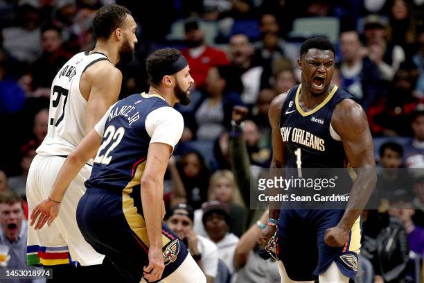 Zion Williamson of the New Orleans Pelicans reacts after scoring during the second quarter of an NBA game against the Minnesota Timberwolves at...