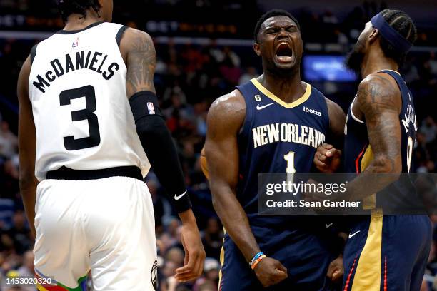 Zion Williamson of the New Orleans Pelicans reacts after scoring during the thrid quarter of an NBA game against the Minnesota Timberwolves at...