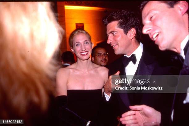 Married American couple, Carolyn Bessette-Kennedy and John F Kennedy Jr , with unidentified others, attend a Municipal Art Society event at Grand...
