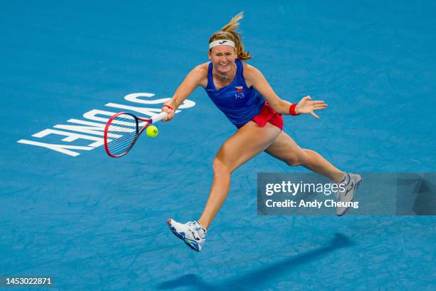 Marie Bouzková of the Czech Republic lunges to play a forehand in her Group C match against Madison Keys of the USA during day one of the 2023 United...