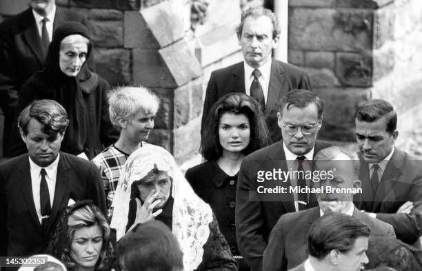 Jacqueline Kennedy , the former First Lady and widow of assassinated US President John F. Kennedy attends the funeral in North Wales of Lady Harlech,...