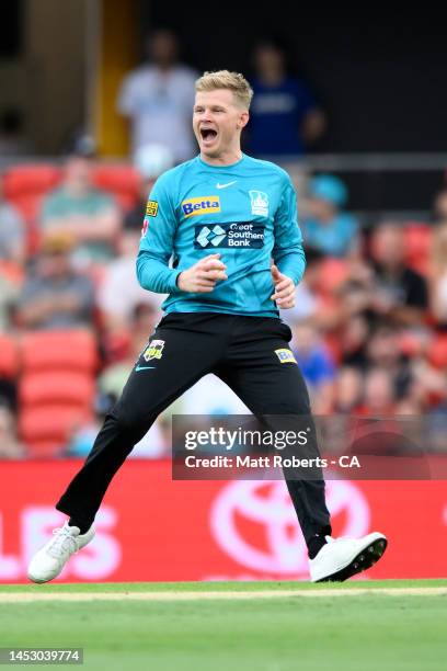 Sam Billings of the Heat fields during the Men's Big Bash League match between the Brisbane Heat and the Sydney Thunder at Metricon Stadium, on...