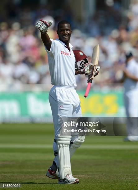 West Indies captain Darren Sammy celebrates reaching his century during day two of the second Test match between England and the West Indies at Trent...