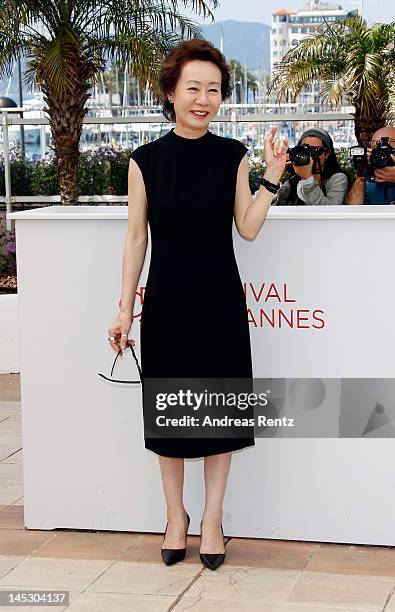 Youn Yuh-jung poses at the 'Do-nui Mat' photocall during the 65th Annual Cannes Film Festival at Palais des Festivals on May 26, 2012 in Cannes,...