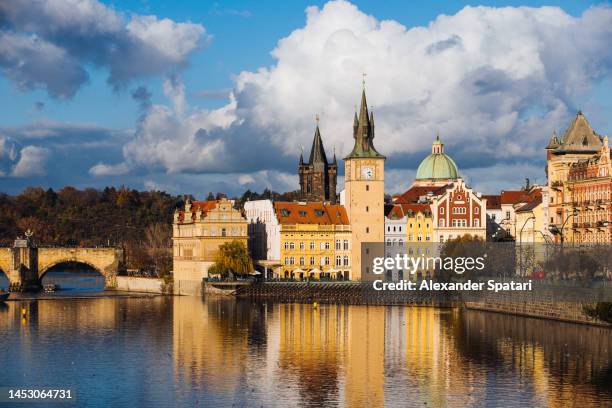 prague old town skyline with charles bridge on a sunny day, czech republic - vltava river stockfoto's en -beelden