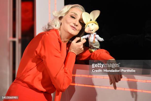 The italian actor, director and conductor Gianluca Gori in art Drusilla Foer and the puppet Topo Gigio during the broadcast Drusilla e l'almanacco...