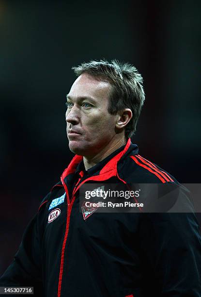Dean Robinson, aka 'The Weapon', Essendon High Performance Manager, looks on during the round nine AFL match between the Greater Western Sydney...