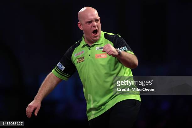Michael van Gerwen of Netherlands celebrates during his Third Round match against Mensur Suljovic of Serbia during Day Nine of The Cazoo World Darts...