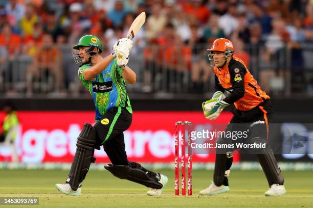 Joe Clarke of the Stars watches the ball after his shot during the Men's Big Bash League match between the Perth Scorchers and the Melbourne Stars at...