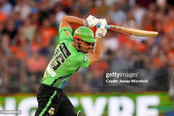 Marcus Stoinis of the Stars plays a cut shot across the ground during the Men's Big Bash League match between the Perth Scorchers and the Melbourne...