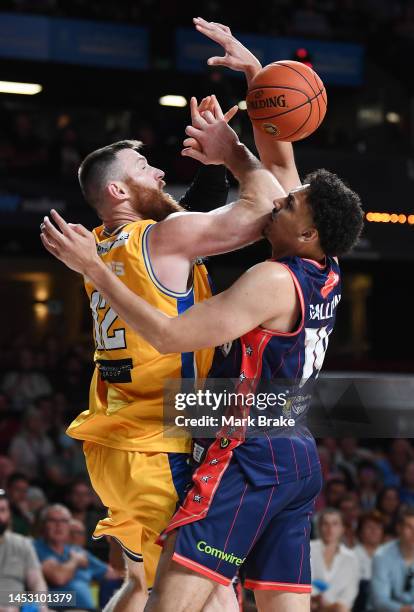 Aron Baynes of the Bullets competes with Kyrin Galloway of the 36ers during the round 13 NBL match between Adelaide 36ers and Brisbane Bullets at...