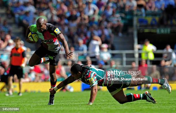 Ugo Monye of Harlequins is tap tackled by Alesana Tuilagi of Leicester during the Aviva Premiership final between Harlequins and Leicester Tigers at...