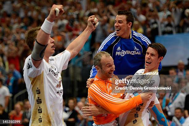 Kiel players celebrate after the EHF Final Four semi final match between Fuechse Berlin and THW Kiel at Lanxess Arena on May 26, 2012 in Cologne,...