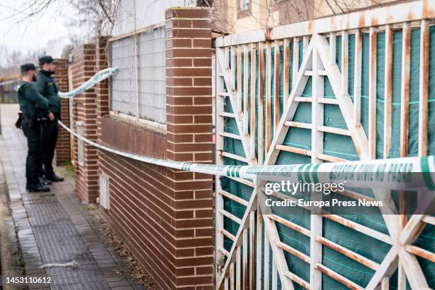 Two civil guards in front of the house where a pregnant woman was found stabbed to death on December 29 in Escalona, Toledo, Castilla-La Mancha,...