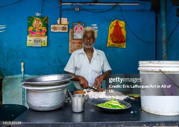 Indian food preparing food in the street, Pondicherry, Puducherry, India on October 29, 2022 in Puducherry, India.