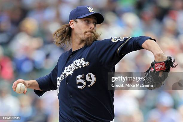 John Axford of the Milwaukee Brewers pitches in the 9th inning against the San Francisco Giants during the game at Miller Park on May 23, 2012 in...