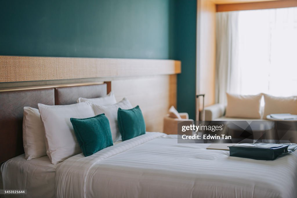 Modern Hotel Room With Double Bed, Night Tables and day sofa bed