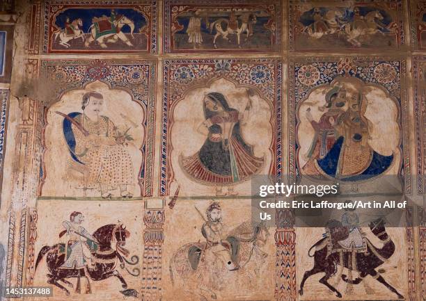 Old mural in a haveli depicting indian people, Rajasthan, Mandawa, India on November 8, 2022 in Mandawa, India.