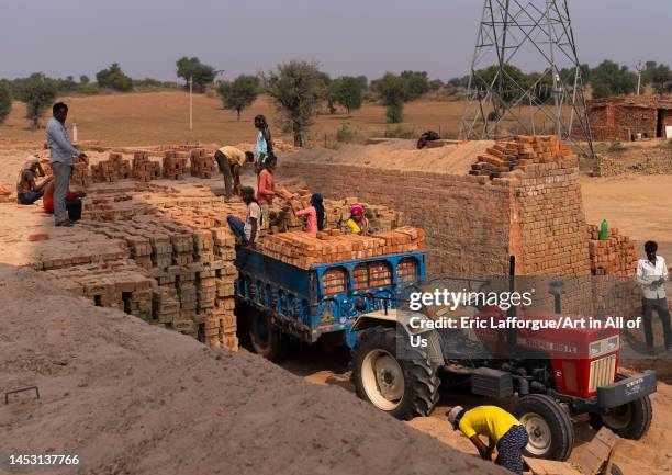 Indian workers in a brick factory, Rajasthan, Mandawa, India on November 7, 2022 in Mandawa, India.